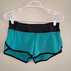 Lululemon size 4 Hotty Hot‎ Teal & Black Athletic Short Shorts